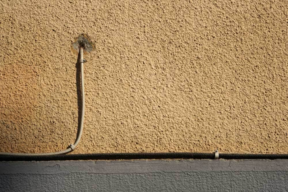 Cable through wall