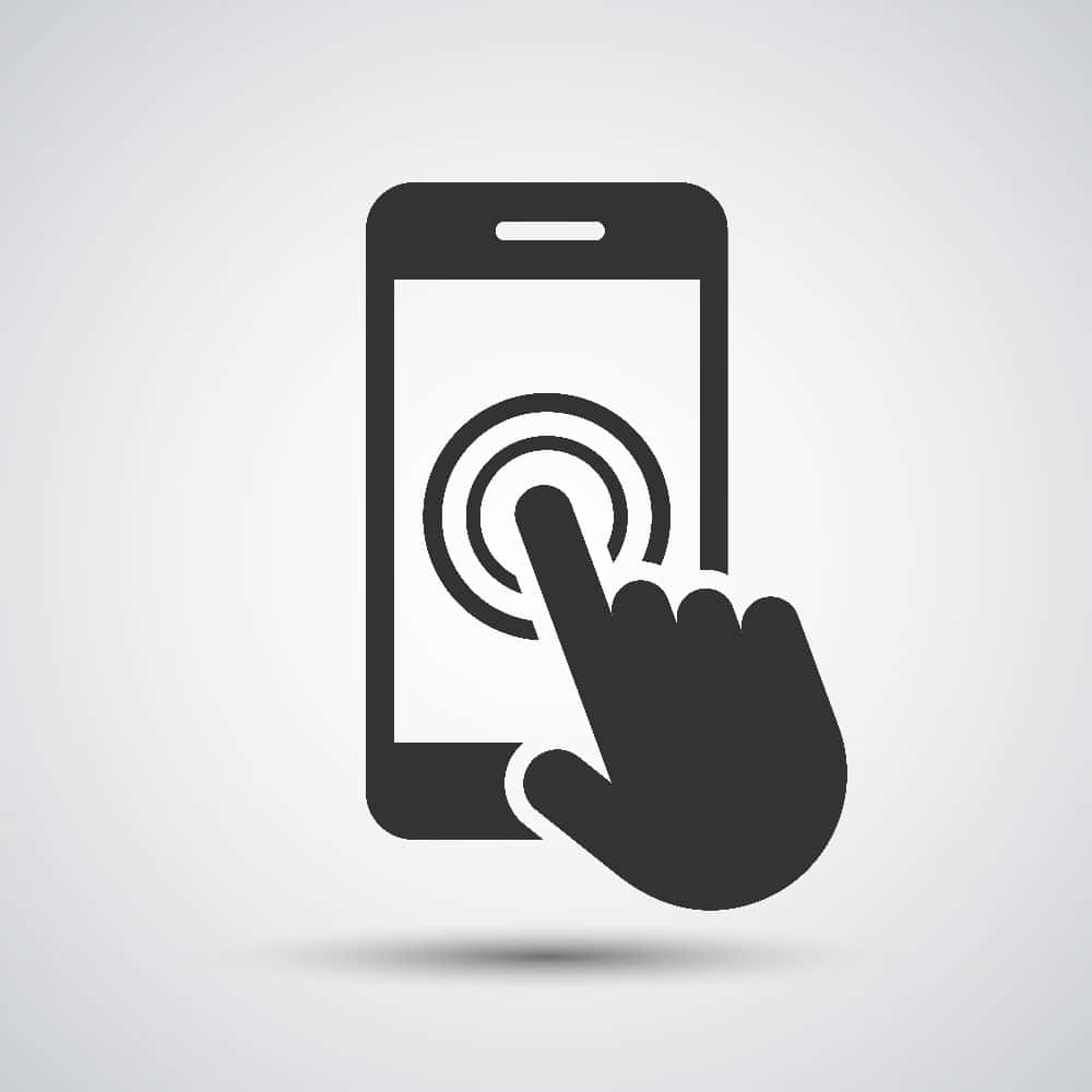 Hand touching the screen of a mobile phone