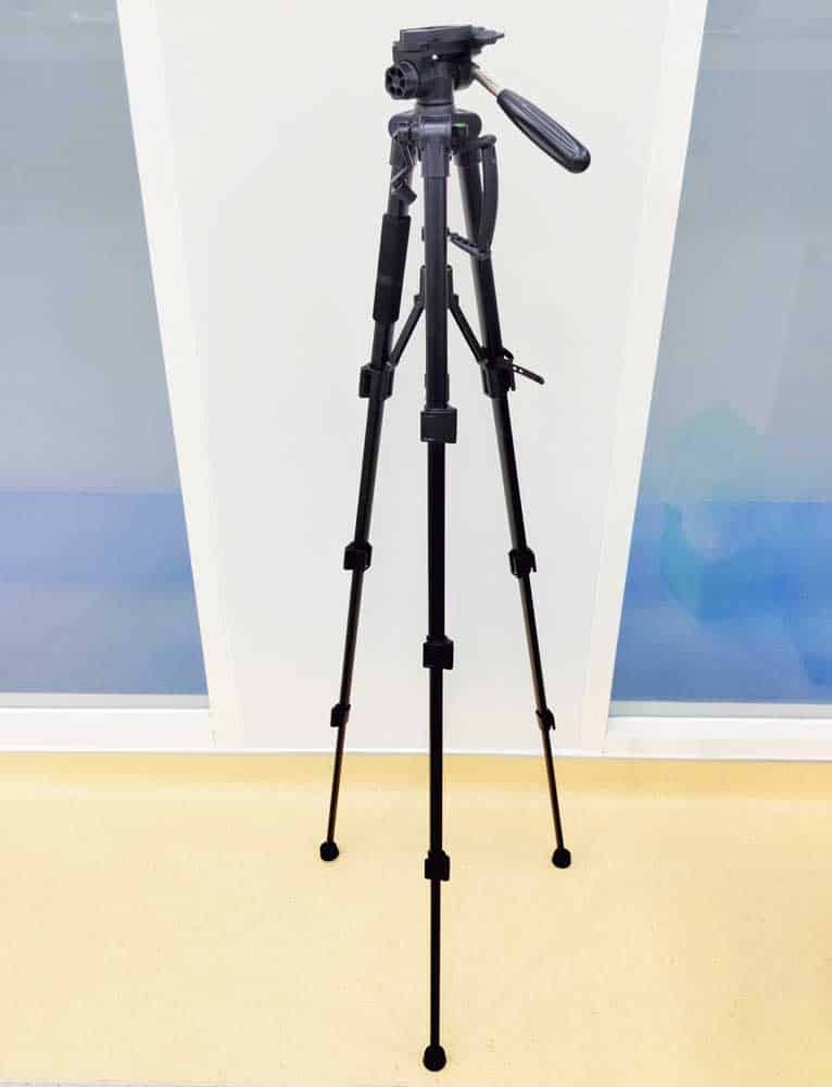 A Photography tripod stand.