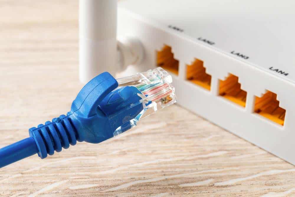 Cabled plugged into a Wi-Fi wireless router